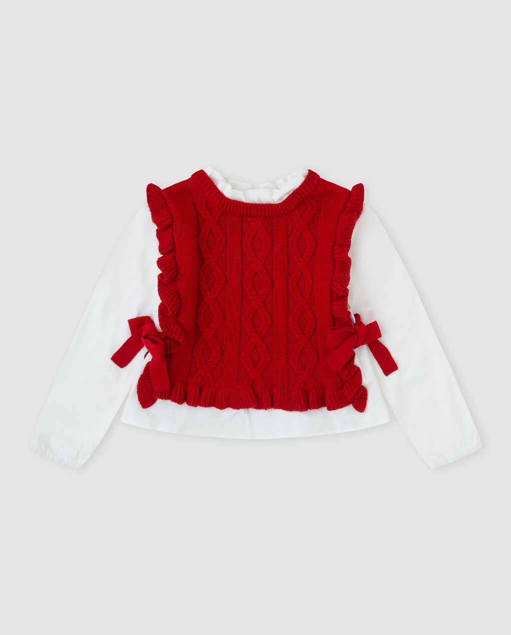 Tutto Piccolo rode gebreide meisjestrui voorkant - kabelpatroon met ruffle randen en rode strikjes, ingebouwde witte mouwen en ruffle kraag als 2-in-1 look