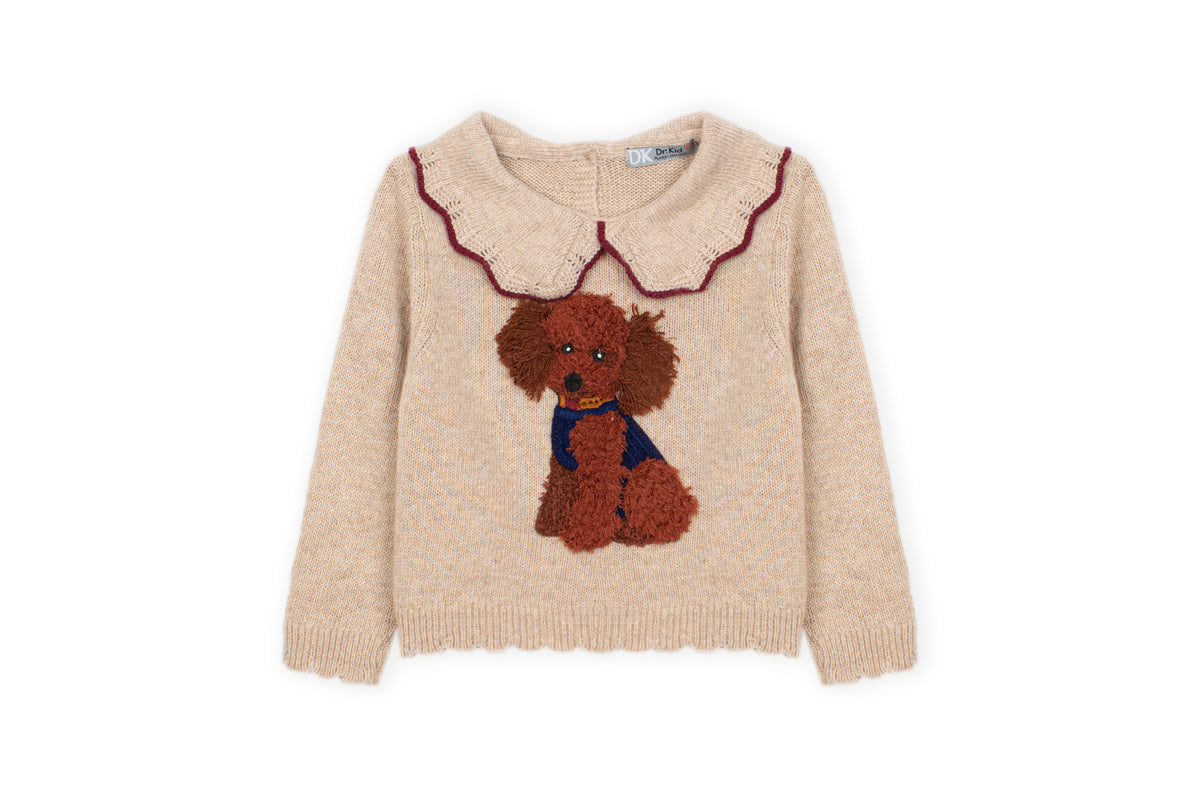 Voorkant van beige Dr. Kid kindertrui met bruin hondje, blauwe accenten en geschulpte kraag
