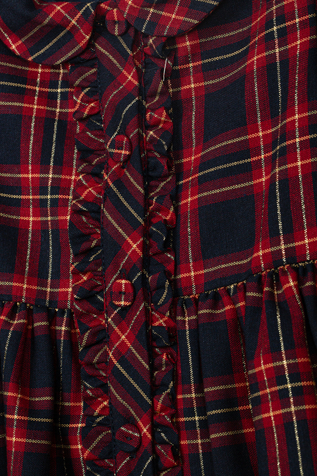 Detailopname ruches en goudkleurige accenten geruite meisjesjurk DK373