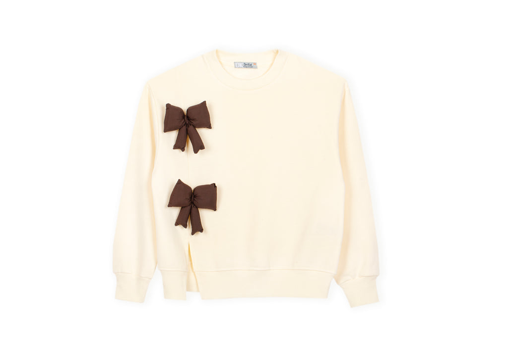 crème sweater met twee bruine 3D-strikken