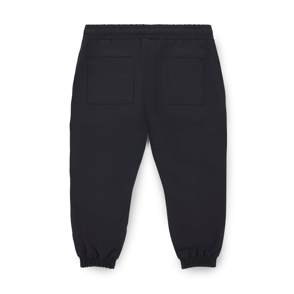 Achterkant navy joggingbroek Waleed van Mitch & Son met patchzakken en geribbelde manchetten, art. MS26614